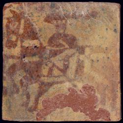 Medieval tile decorated with horseman